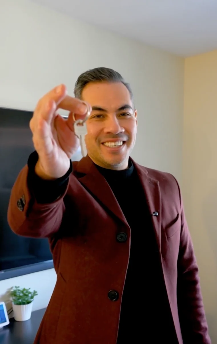 Joe touring a home with buyers