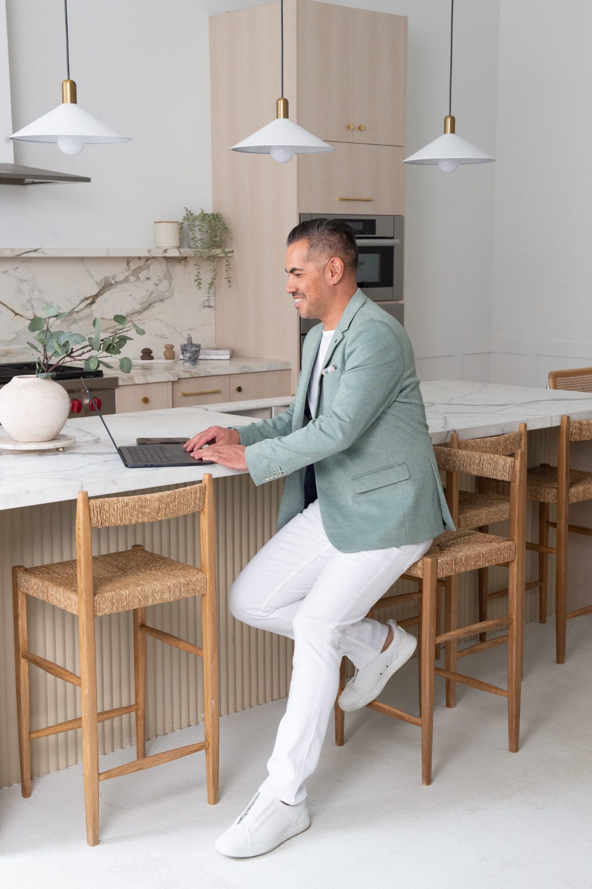 Joe Rea working at a kitchen island